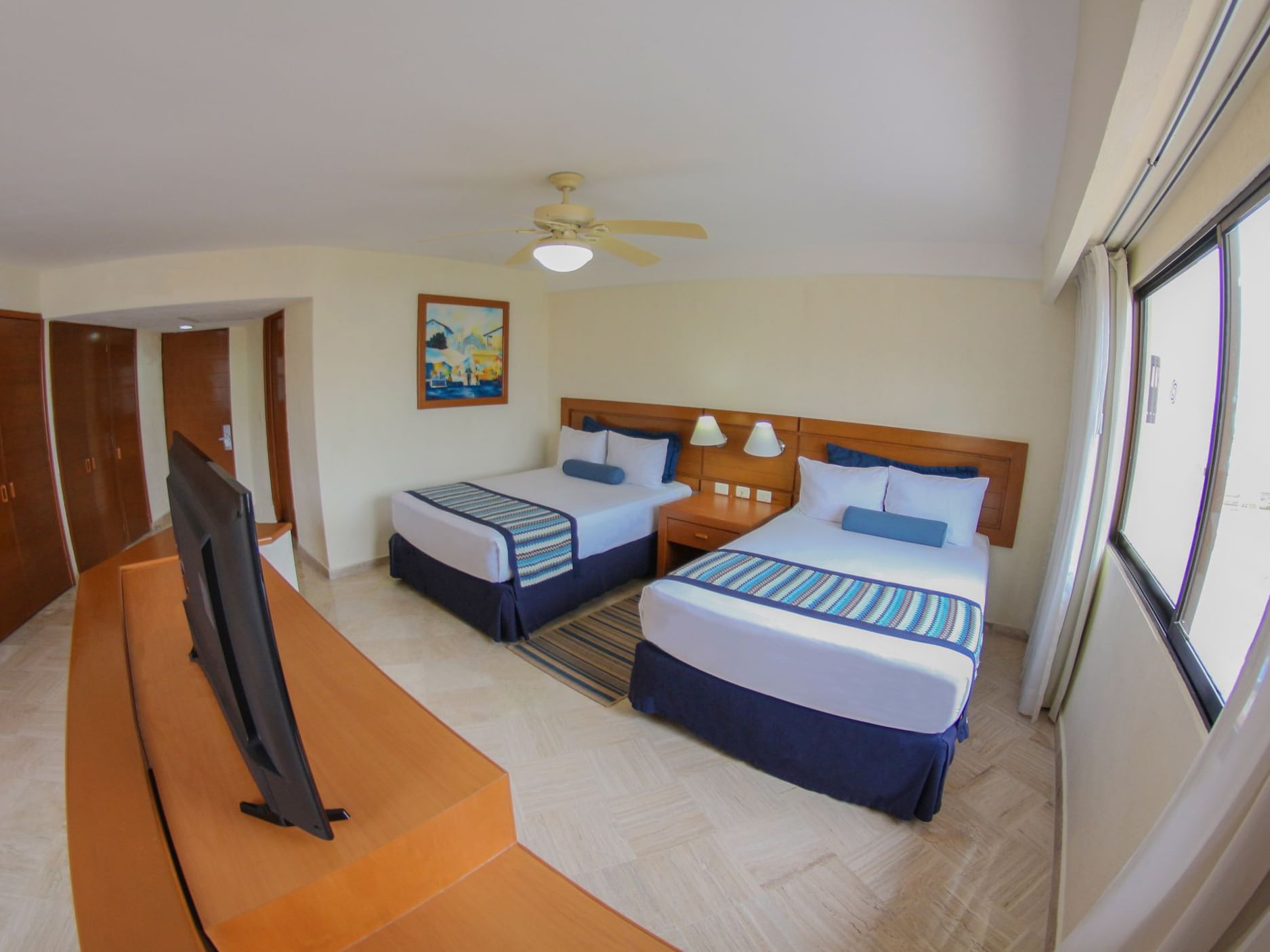 Double Bed Room at Plaza Pelicanos Grand Beach Resort Hotel