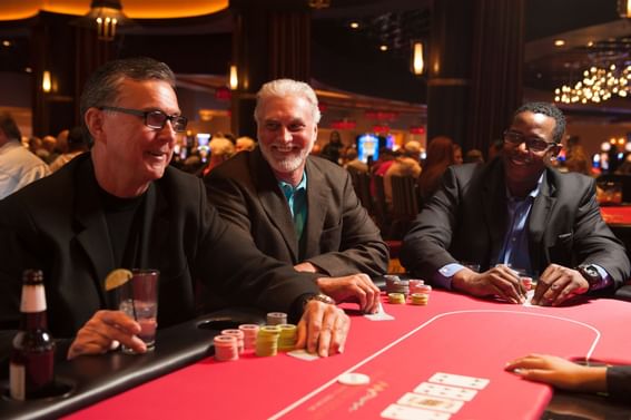 A group playing gambling games in a casino near Pearl River