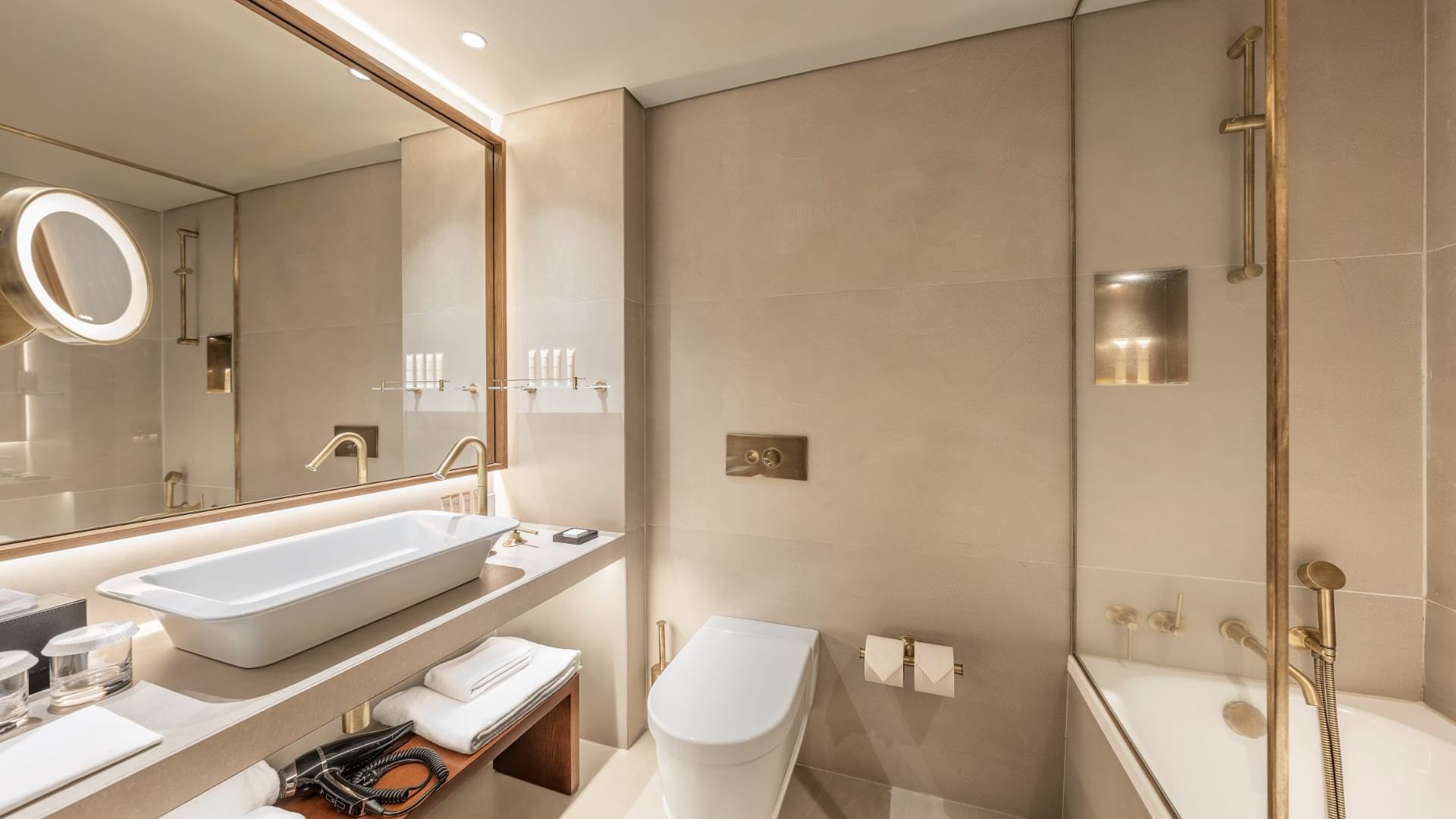 Mirror & wash basin area in bathroom at Bensaude Hotels