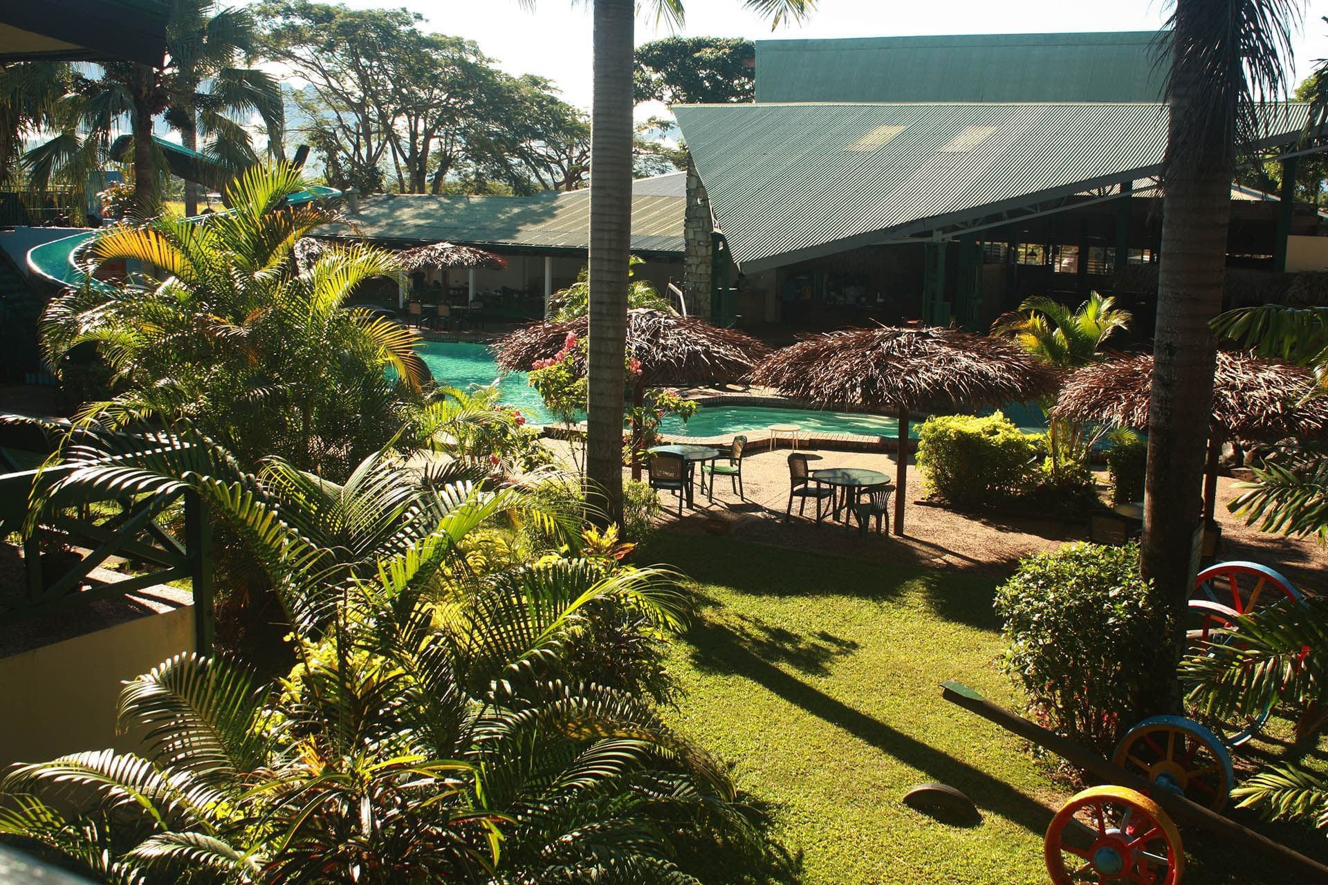 The pool surrounded by the garden at Tokatoka Resort