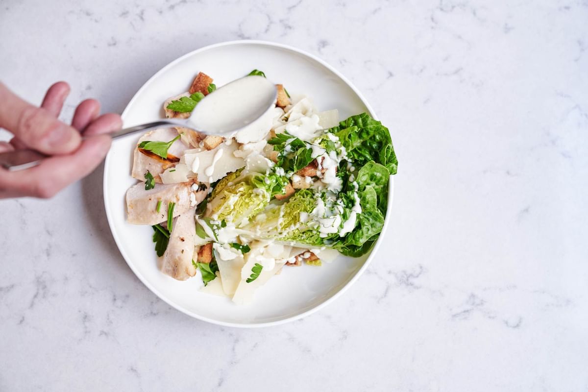 Modern Caesar salad garnishing at Flemings Munchen Schwabing