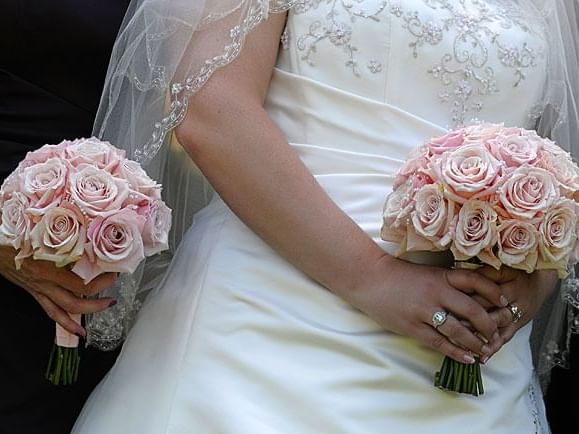 brides dress and flowers