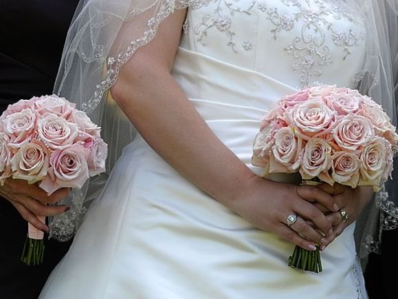 brides dress and flowers