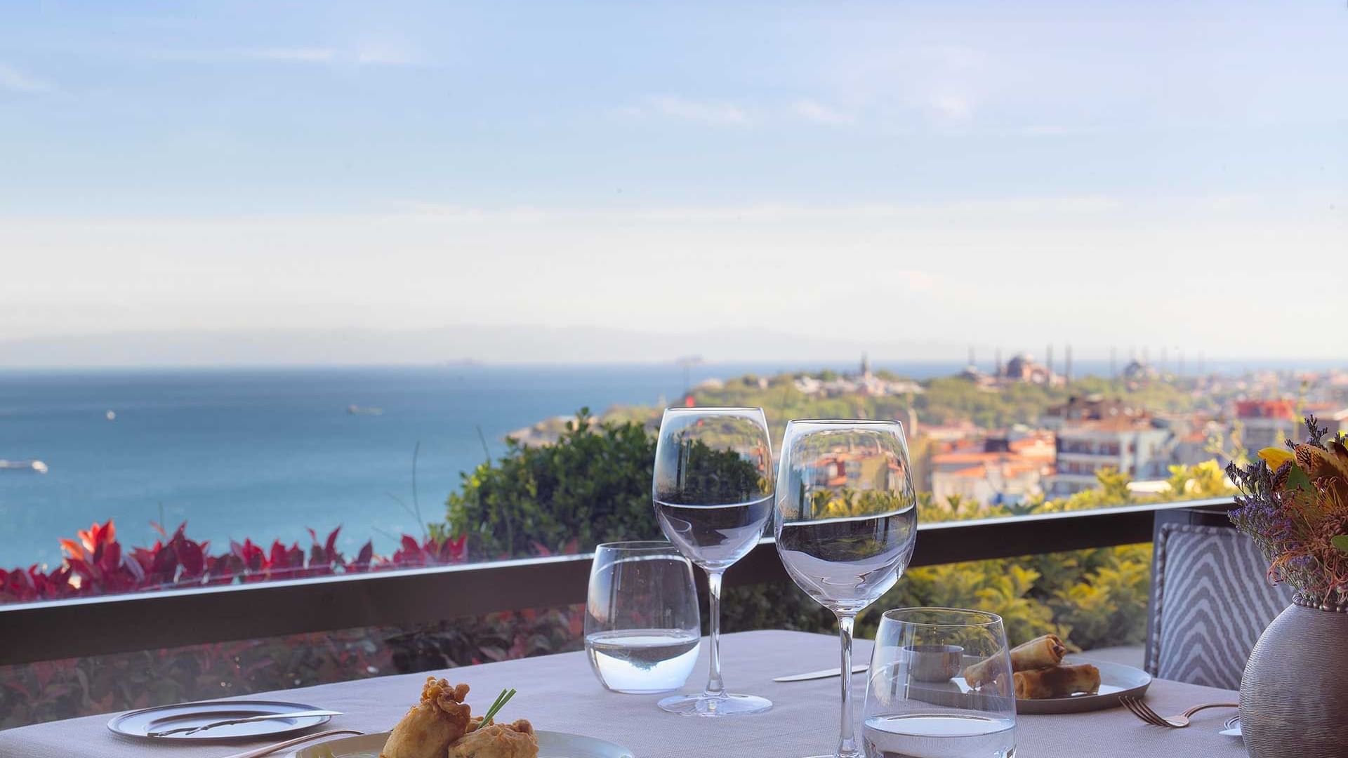 Rooftop dining table arranged in Izaka Terrace at CVK Park Bosphorus Hotel Istanbul