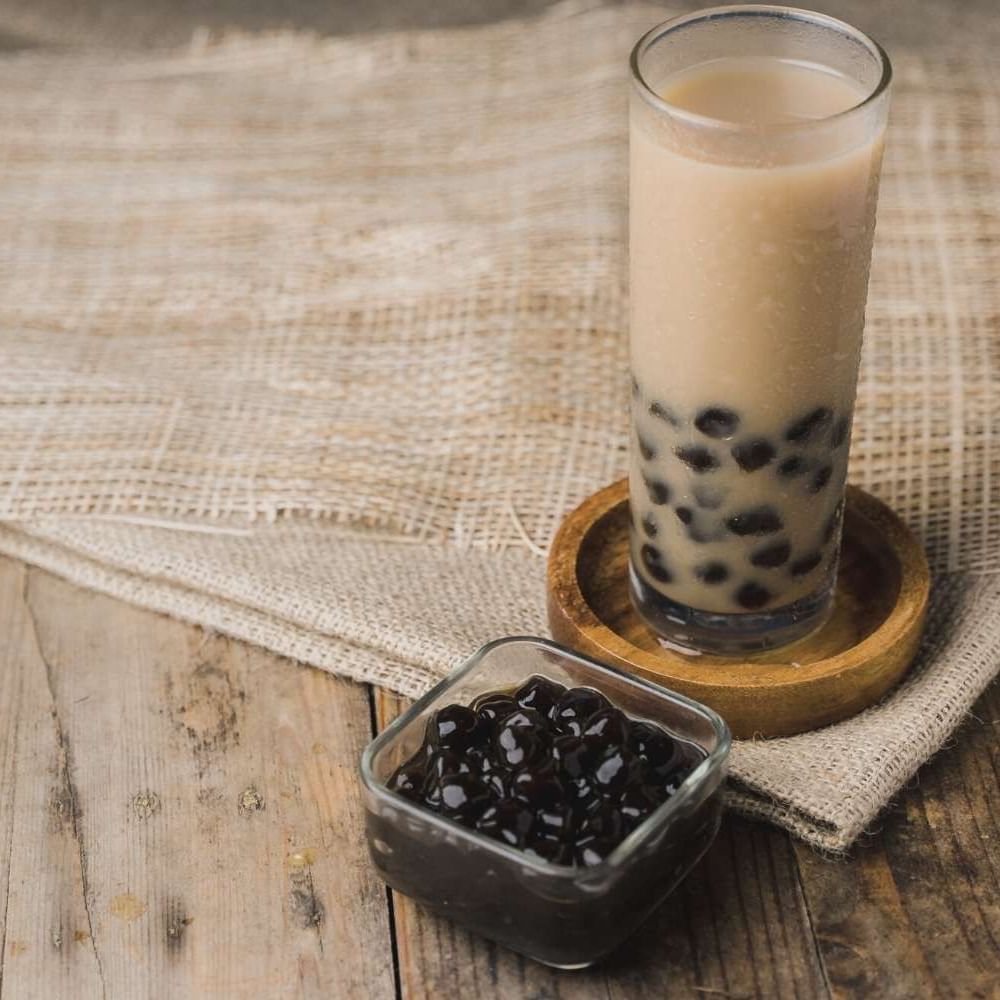 Close-up of an ice coffee boba tea served at Waikiki Resort Hotel by Sono