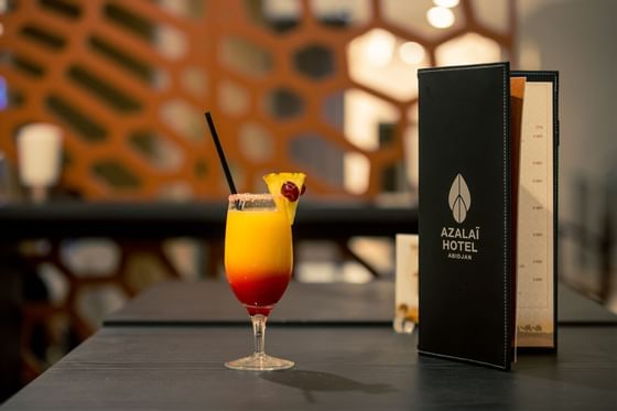 Cocktail beside the menu bar