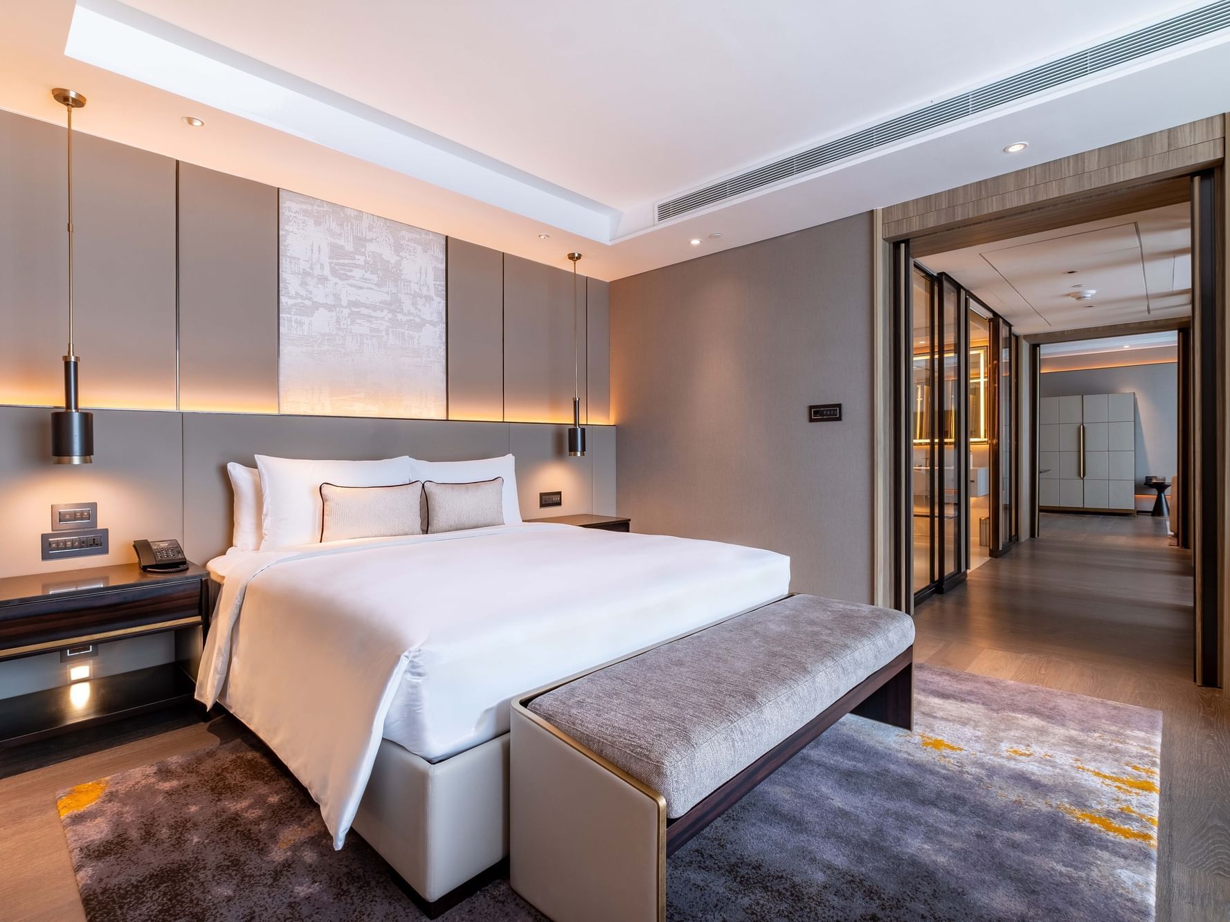 Elegant interior with a warm ambience in Two Bedroom Carlton Suite at Carlton Hotel Bangkok Sukhumvit