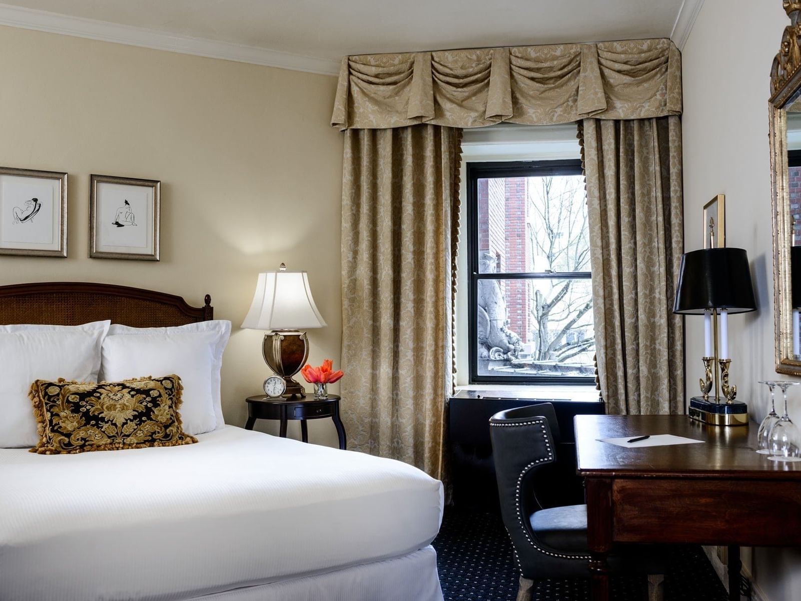 Interior of Classico Queen Room with sofa at Hotel Sorrento