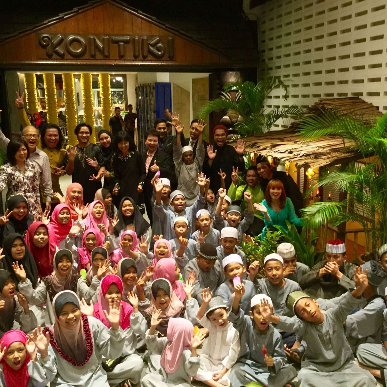 Group of kids posing to camera at The Federal Kuala Lumpur