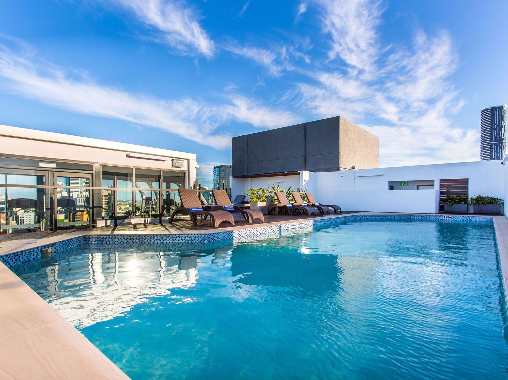 Rooftop pool in day time at Grand Chancellor Brisbane