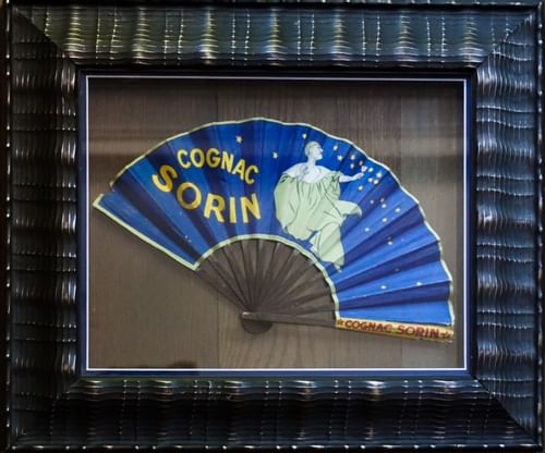 Close-up of a Cognac Sorin fan at Ivey's Hotel