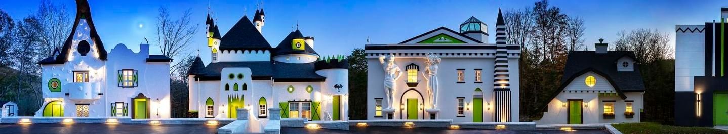 Stratton Falls Fantasy Cottages with bright doors and various architectural styles at The Roxbury
