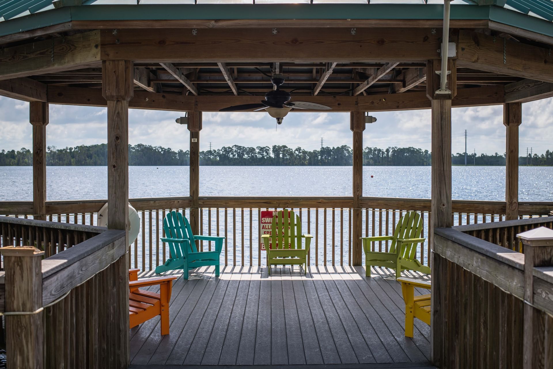 chairs in gazebo overlooking lake
