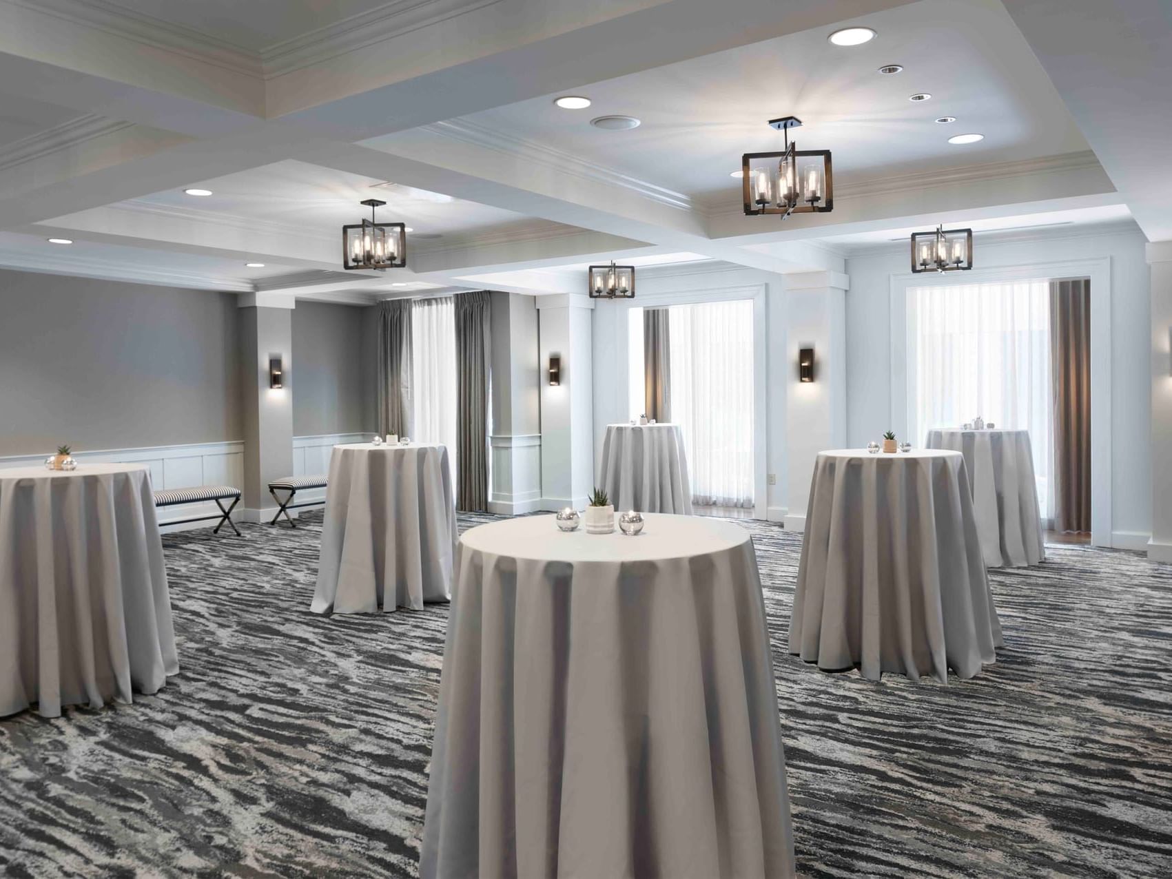 McKinley Room with draped round tables and carpeted floors at Portland Harbor Hotel