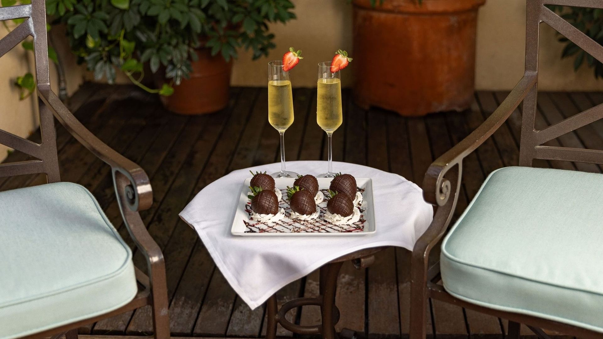 Shared Moment on Spa Patio with Champagne and Strawberries