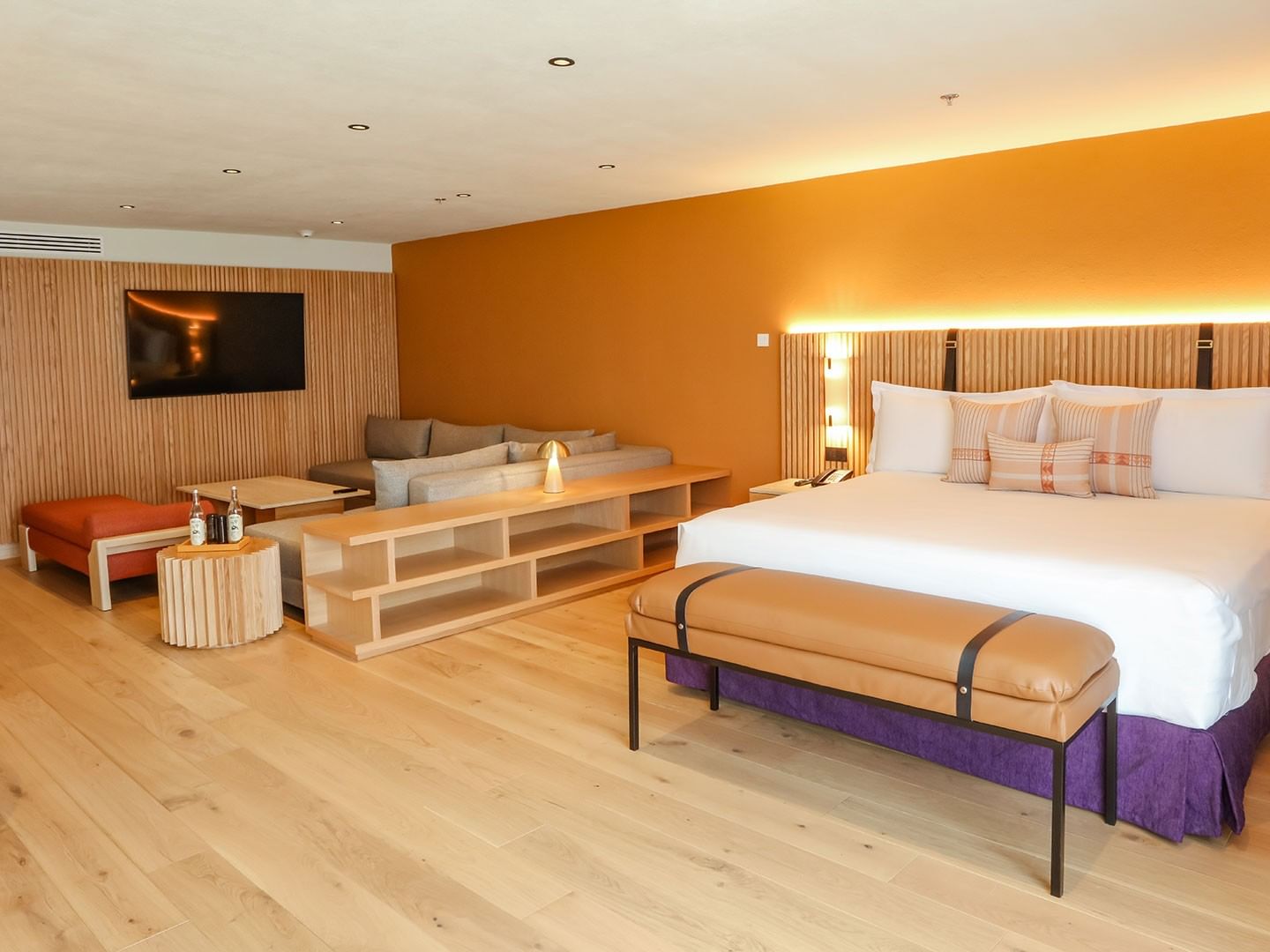 Spacious King Superior Junior Suite with large bed and lounge area at Camino Real Polanco Mexico in Ciudad de Mexico.