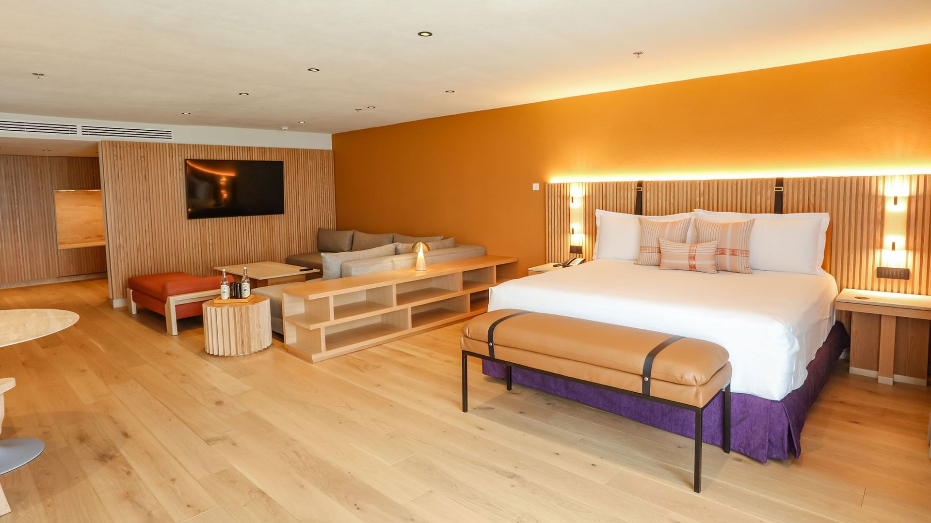 Spacious King Superior Junior Suite with large bed and lounge area at Camino Real Polanco Mexico in Ciudad de Mexico.