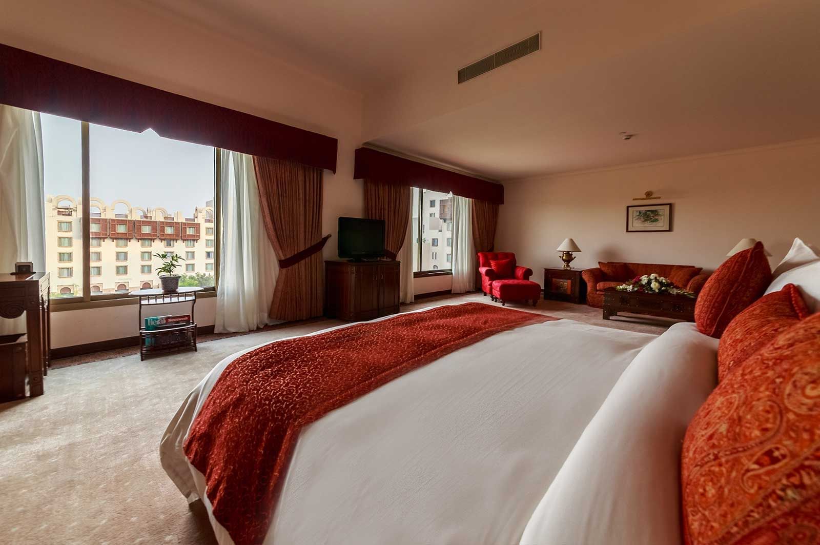 King bed in the Junior Suite at Islamabad Serena Hotel