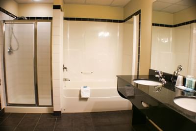 Bathroom with walk in shower and tub