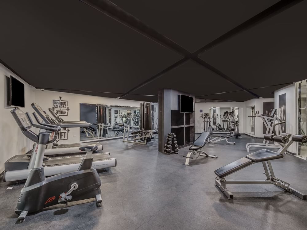 Interior of the fitness center at FA Hotels & Resorts