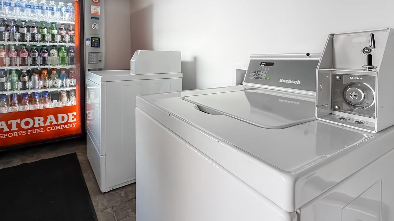 Washer and dryer at Coast Dawson Creek Hotel.