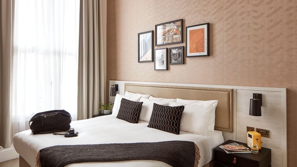 Comfy king bed in Studio Suite at The Clermont Victoria