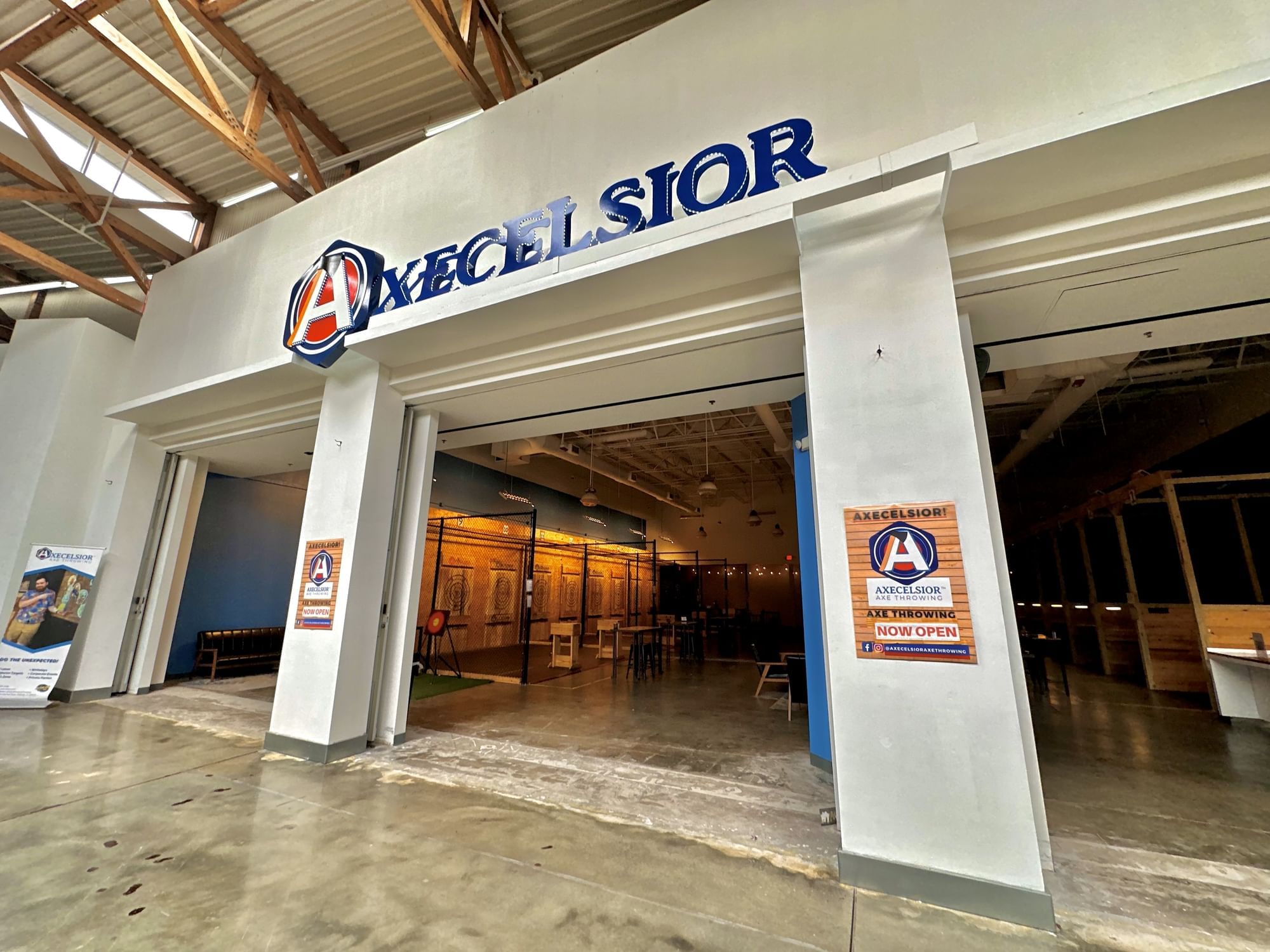 Exterior image of axe-throwing venue Axecelsior, located inside of Dezerland Park Orlando.
