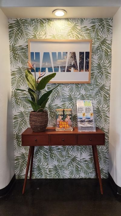 Hawaii picture & handouts on a table at Stay Hotel Waikiki