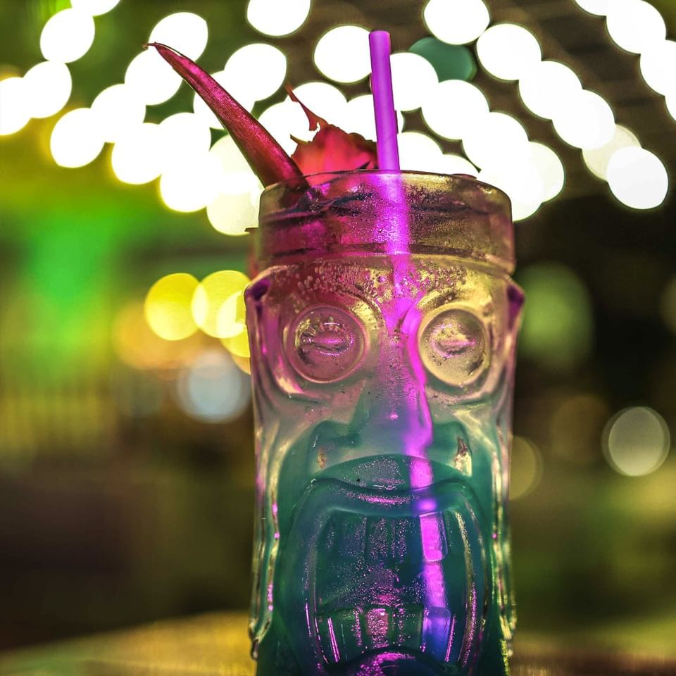 Close-up of a Mojito glass with a face served at Fairwind Hotel Miami