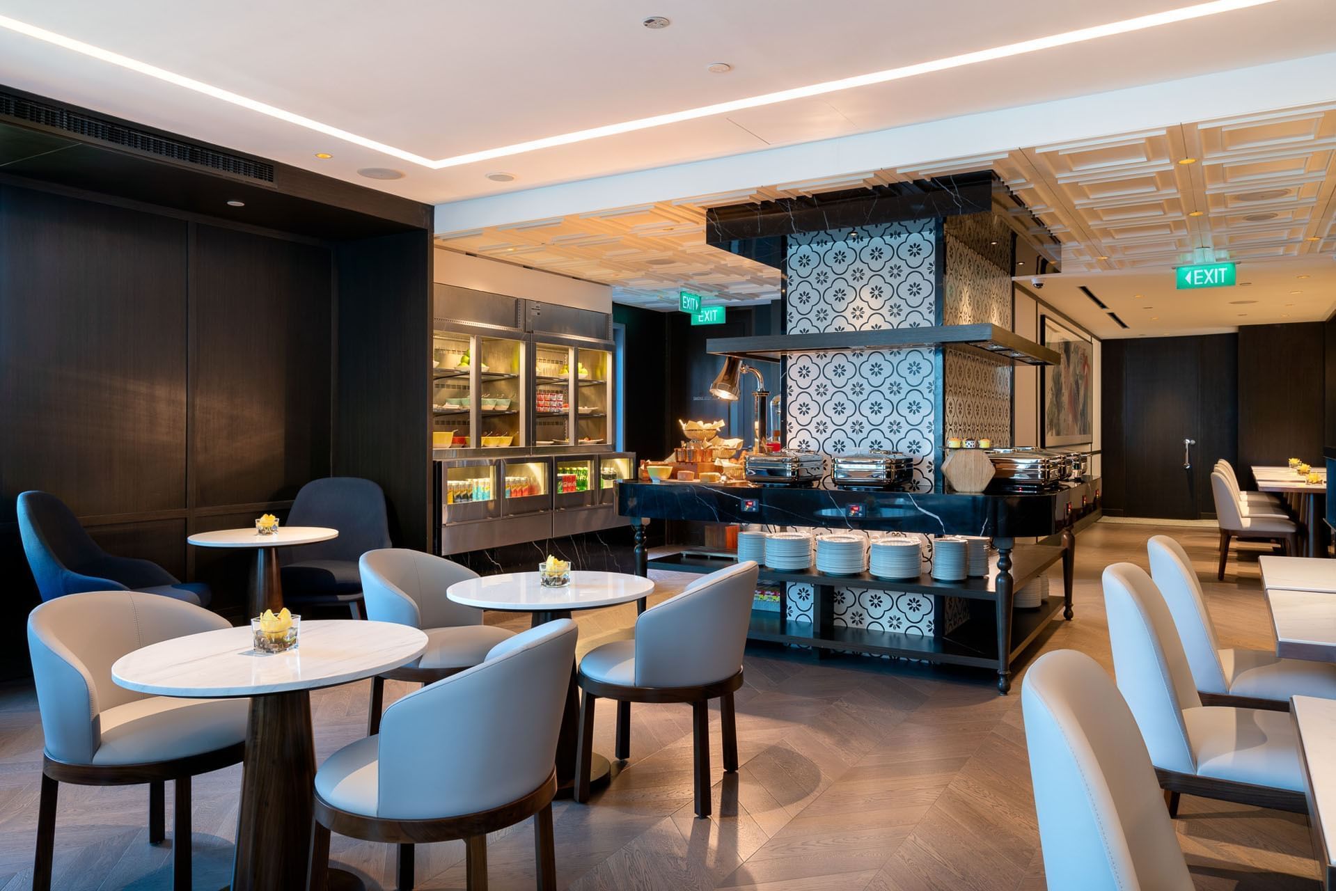 Buffet by cozy dining area in Crystal Club Lounge at Grand Park City Hall