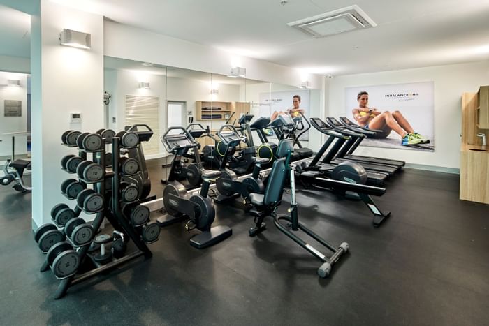 Interior of fully equipped gym at Novotel Melbourne on Collins