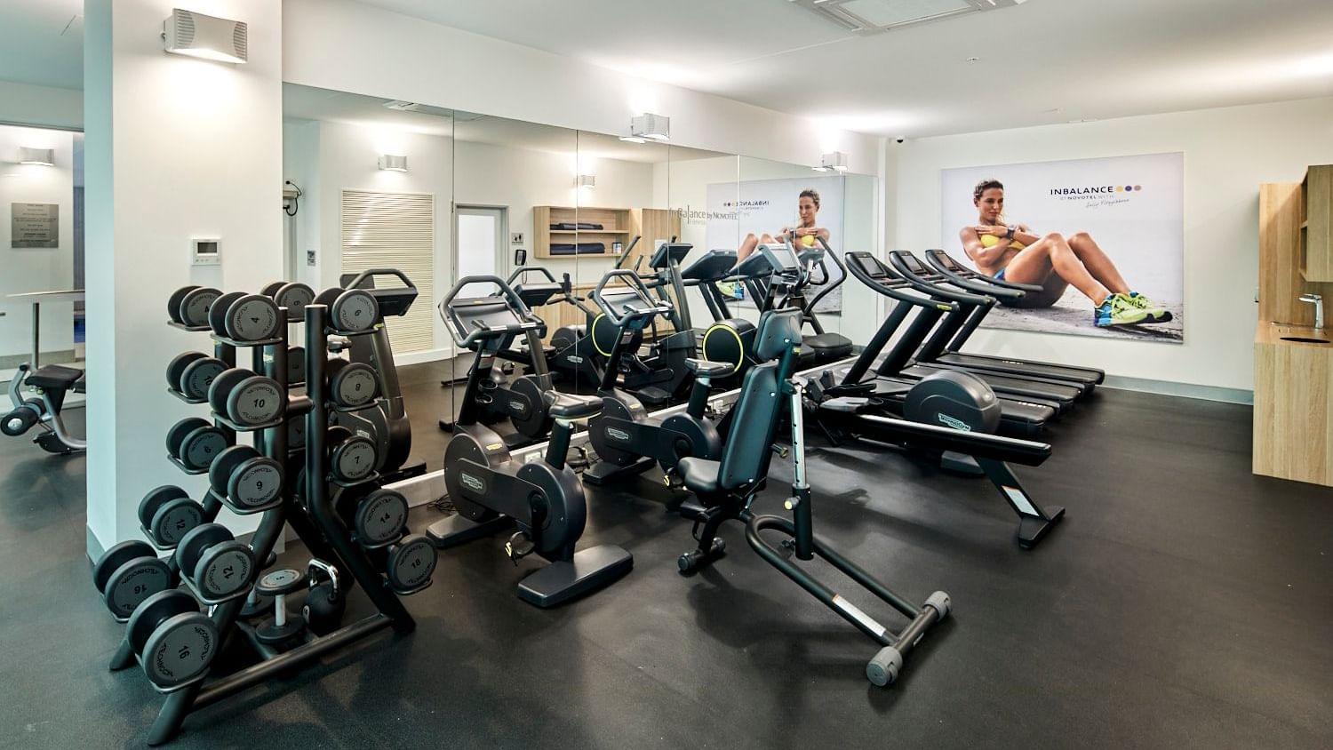 Interior of fully equipped gym at Novotel Melbourne on Collins