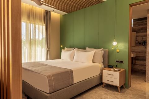 King bed in Villa Suite at Golden Rock Resort