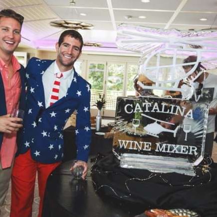 Two men standing by a wine mixer at Catalina Island Company