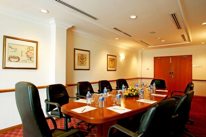 Boardroom table arrange with meeting amenities at Sunway Hotel Phnom Penh