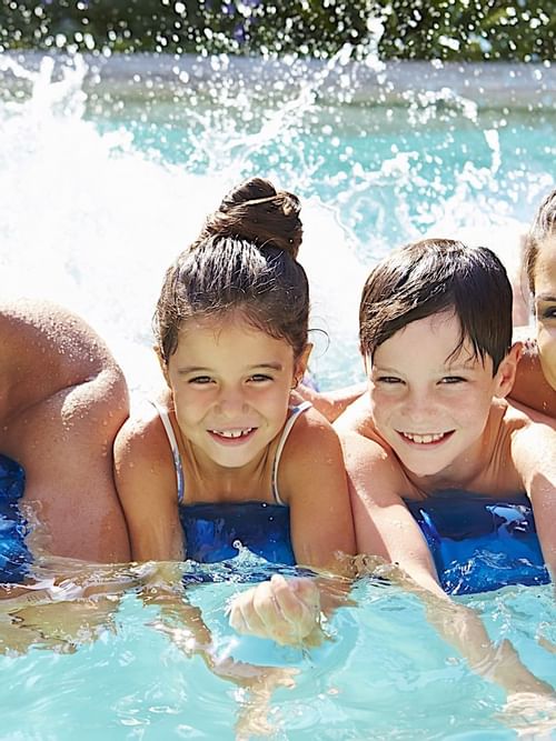 A family in the pool at Princess Mundo Imperial