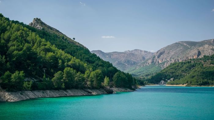 Lake & mountains in Canal Du Midi near The Originals Hotels