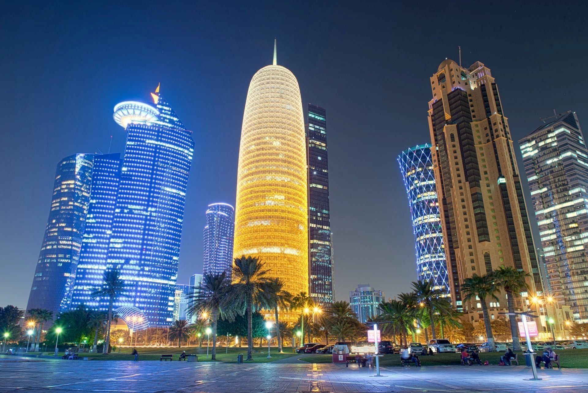 Tall buildings Illuminated at night near Warwick Doha