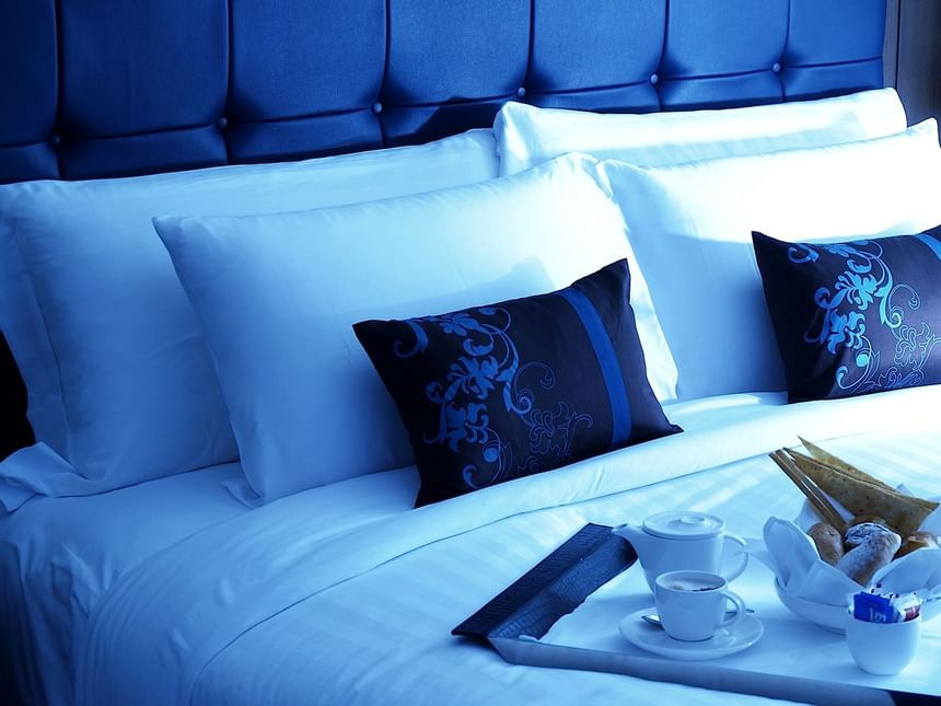 Dream bedding bed on a arranged tea set at Dream Bangkok 