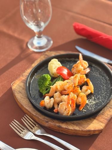 Shrimp and vegetables on a plate at Grill & Pool Bar, Warwick Fiji Resort and Spa, Korolevu