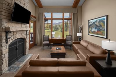 TV lounge with fireplace by the window in Cottage Deluxe Executive Suites at Hotel Park City Autograph Collection 