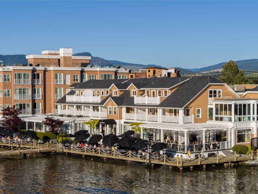 Exterior view of Hotel Eldorado with outdoor seating area on a wooden pier