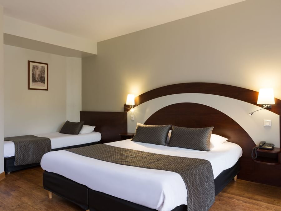 Triple Comfort bedroom with twin beds at The Originals Hotels