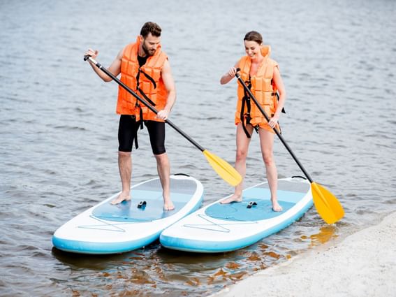 Couple paddleboarding on the Beach, Tanjung Rhu Resort Langkawi