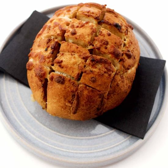 crusty and cheesy cob loaf roll as entrée at barretts