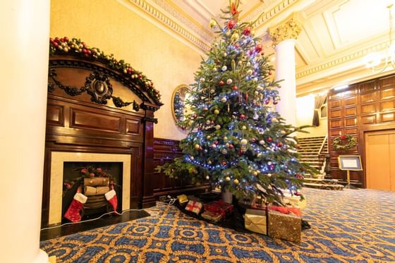 Christmas tree near fireplace at The Imperial Hotel Blackpool