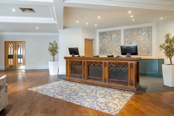 Front desk in the reception area at Bridgewood Manor Hotel