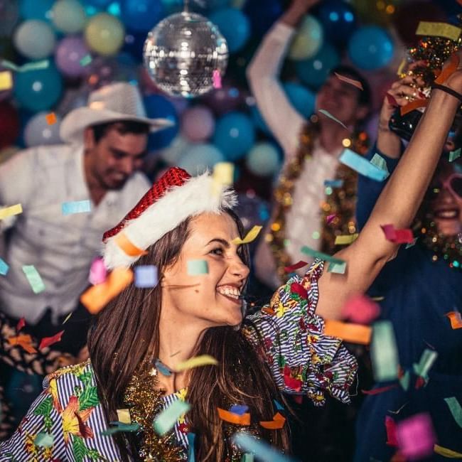 People dancing at Christmas Party featuring our article on 