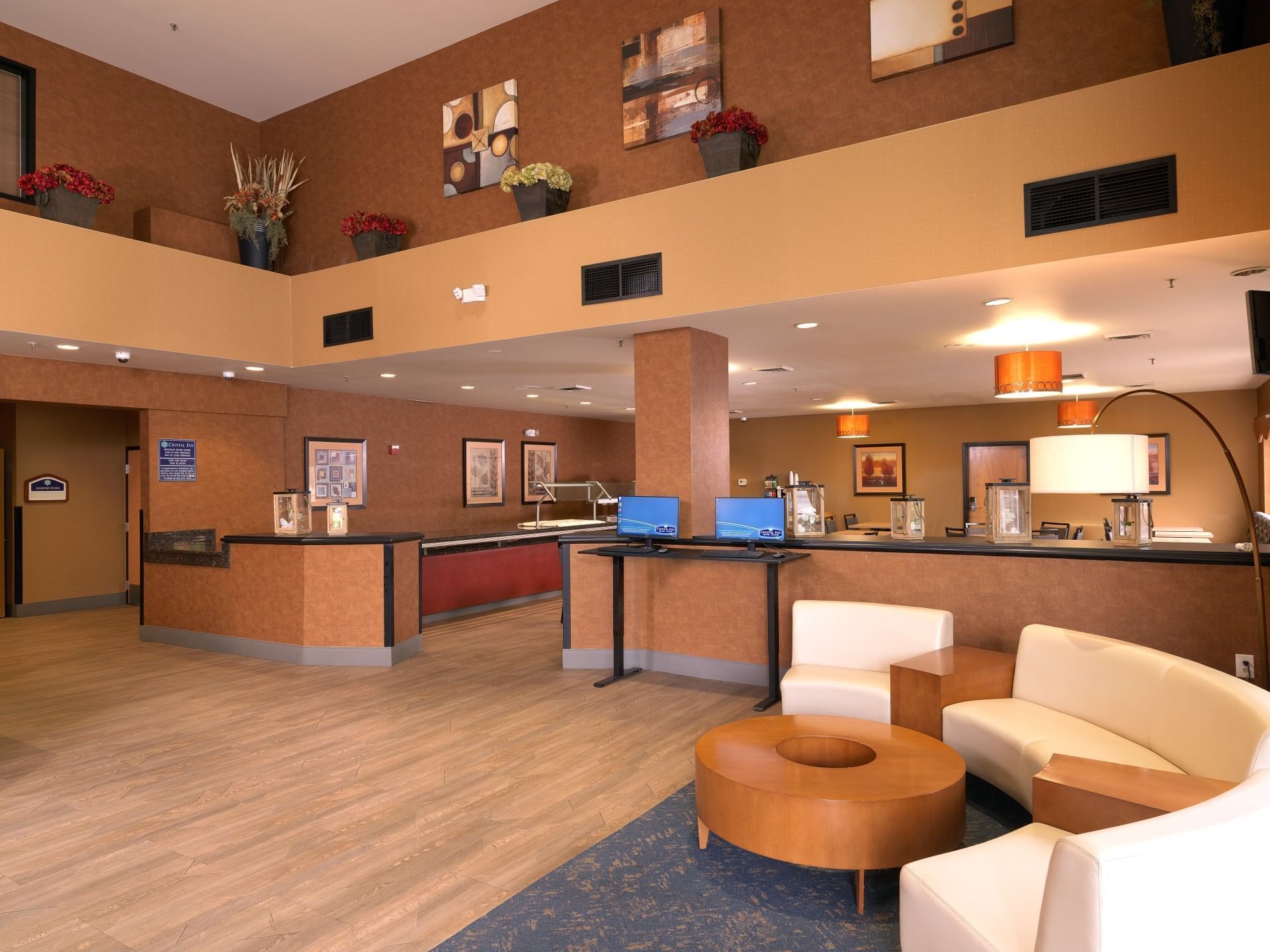 Entrance lobby area with reception area at Crystal Inn Hotel & Suites