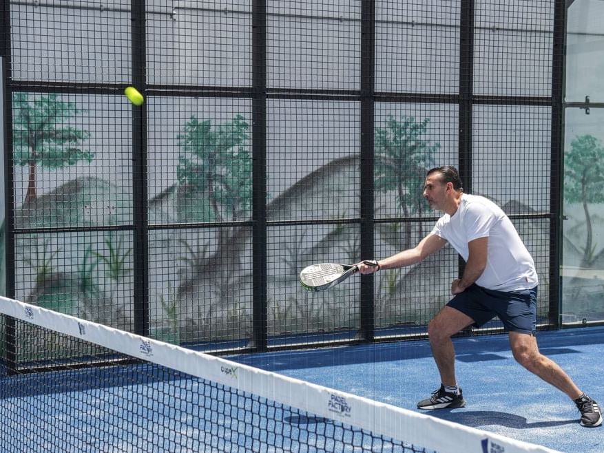 A man playing padel